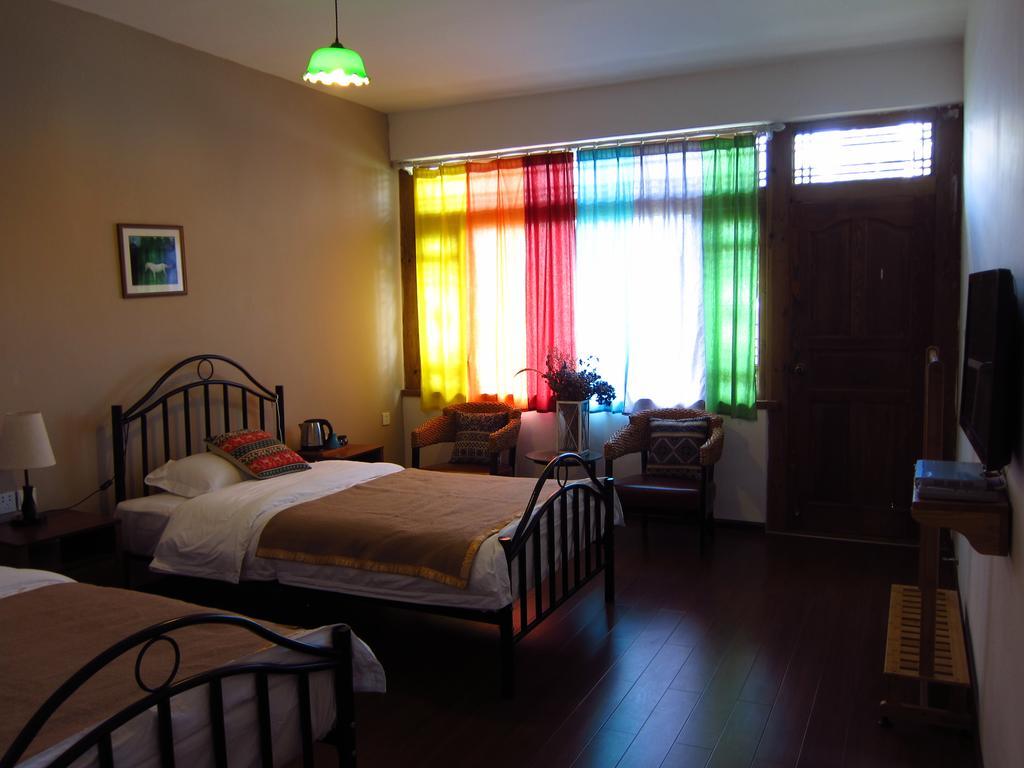 Lijiang Baisha There International Youth Hostel Chambre photo